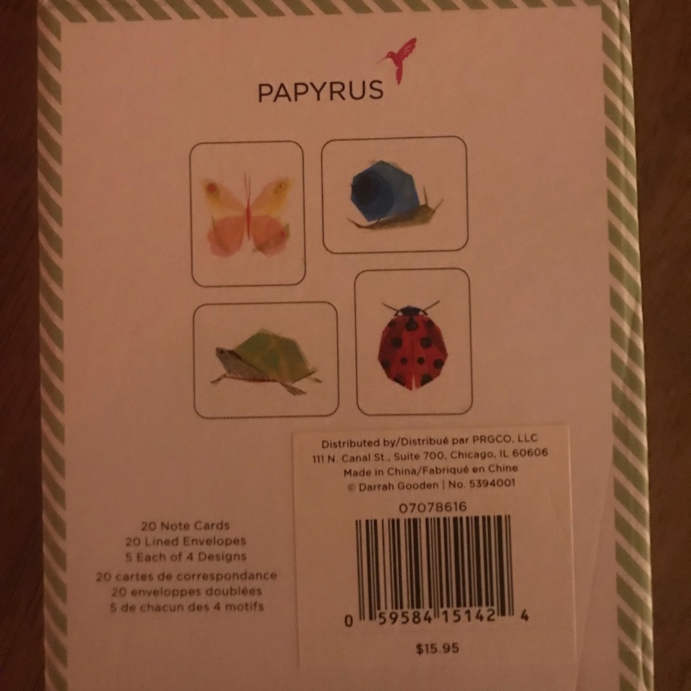 Papyrus notecards with hummingbird stickers, envelopes, never used. Boxed.